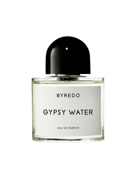 A bottle of Baccarats Gypsy Water EDP For Men and Women. The transparent cylindrical glass bottle features a white label with black text and a black rounded cap. Embracing the essence of nomadism, the fragrance name "Gypsy Water" and "Eau de Parfum" are elegantly displayed on the label.