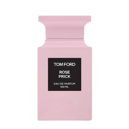 A pink bottle of Baccarats' Tom Ford Rose Prick Eau de Parfum for Men and Women, 100 ml, emits a warm floral fragrance that evokes the essence of a secluded rose garden. It features a black rectangular label displaying the brand and fragrance name, set against its sleek, minimalist design.