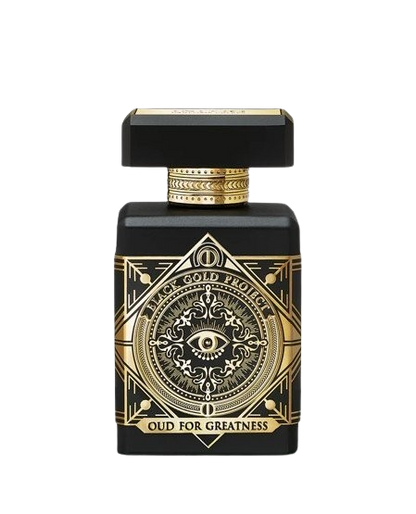 A 90ml bottle of Baccarats' Initio Oud for Greatness EDP. The black bottle, adorned with elaborate gold detailing, features an intricate design highlighted by a prominent eye motif on the front. Infused with rich and captivating notes of patchouli and oud wood, the fragrance exemplifies luxury. The cap is black with elegant gold accents.