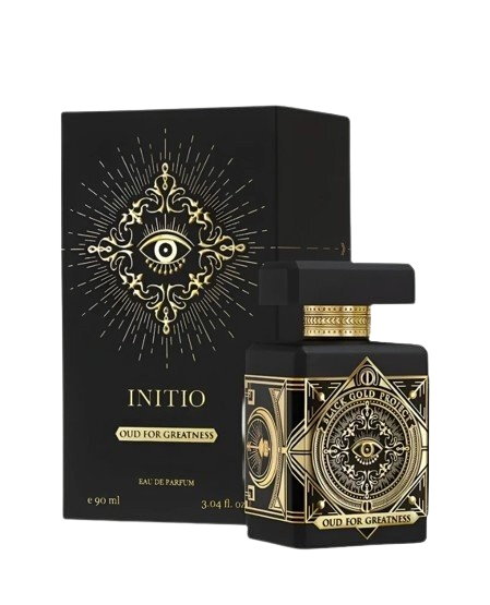 A 90ml bottle of Baccarats' Initio Oud for Greatness EDP. The black bottle, adorned with elaborate gold detailing, features an intricate design highlighted by a prominent eye motif on the front. Infused with rich and captivating notes of patchouli and oud wood, the fragrance exemplifies luxury. The cap is black with elegant gold accents.